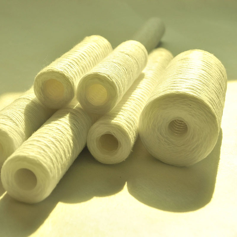 Filtro tubular con herida de algodón