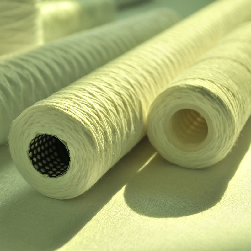Filtro tubular con herida de algodón
